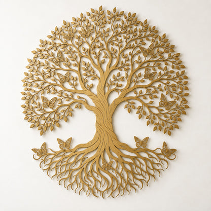 Gold Tree of Life metal wall art with a round leafy canopy, butterflies and flared curling roots on a plain white wall